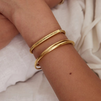 Motivational gold beaded bracelet worn on wrist — Olivia Jewelry