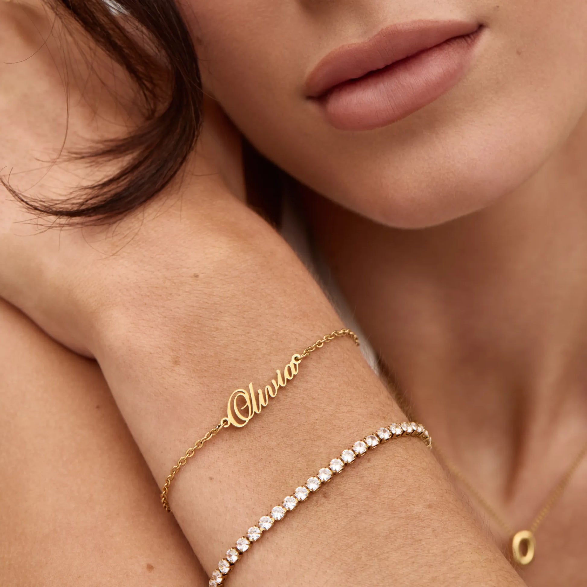 Signature name bracelet flat lay — Olivia Jewelry
